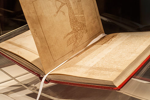 A beautifully lit image of the Book of Armagh, in St Patrick’s Trian Centre, Northern Ireland. 