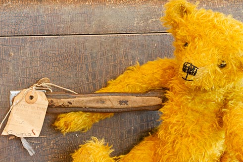 A beautiful hand-crafted bear, sitting with a suitcase – commissioned product photography for Emily’s Ark. 