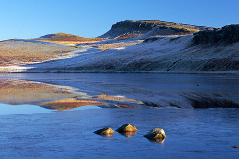 A frosty winter image of Broomlee Lough, commissioned by Northumberland National Park Authority.