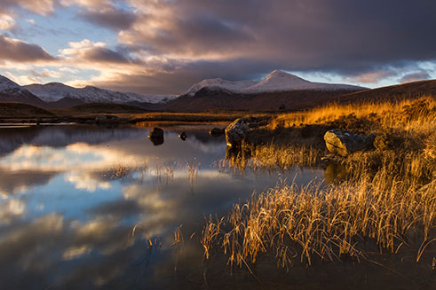 A beautiful photographic image of sunset over Rannoch Moor, in the Scottish Highlands, in winter. 